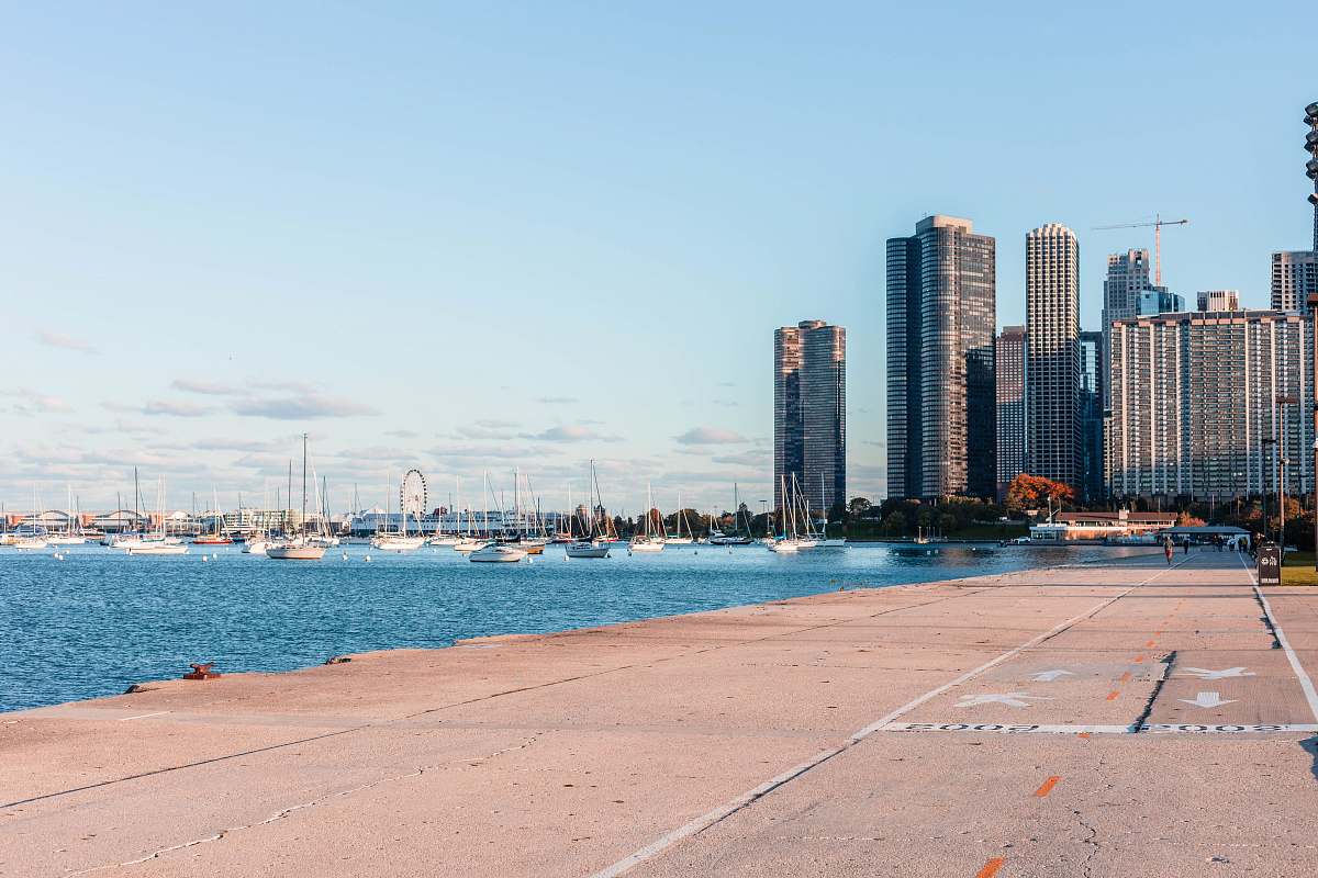 lakefront trail city buldings beside body of water chicago